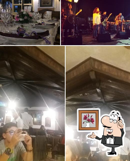 Siediti a un tavolo di Birreria Pub Hurricane