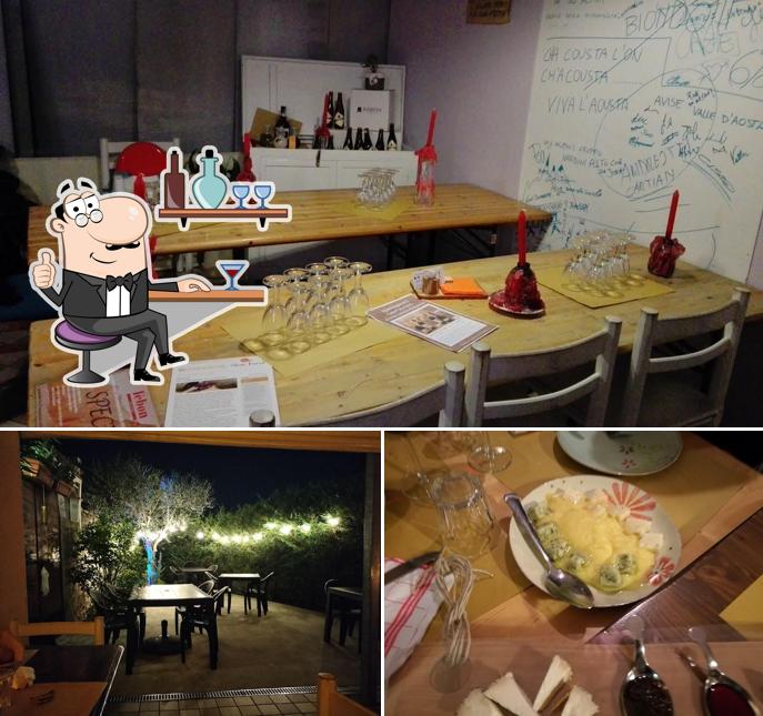 La foto della interni e tavolo da pranzo di Osteria Na scarpa e un Folpo