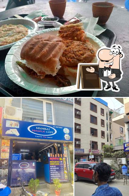 Check out the image depicting exterior and interior at Mumbai Masala Cafe