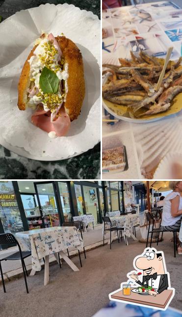 Tra le varie cose da Pizzeria La Veranda si possono trovare la cibo e interni