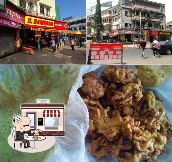 Among different things one can find exterior and food at D Damodar Mithaiwala sweet shop