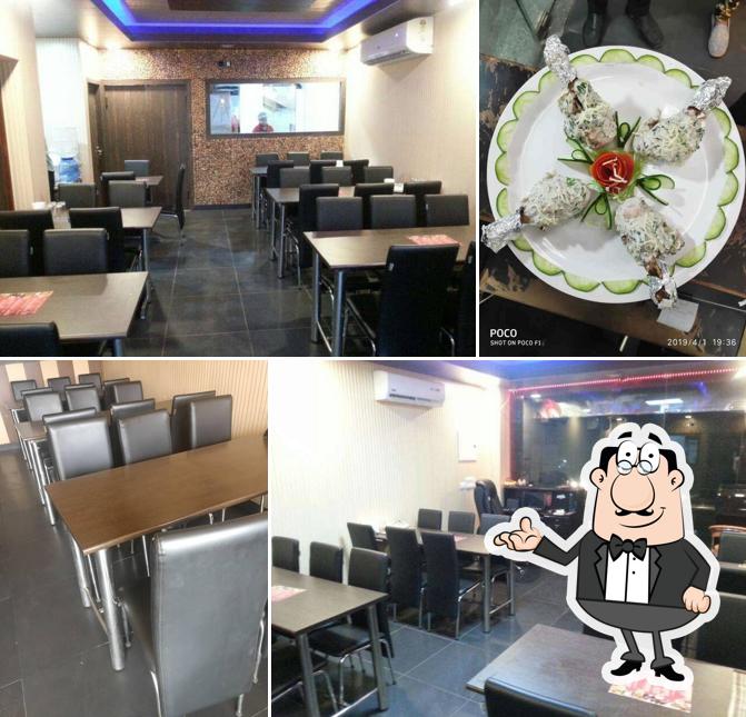 Take a seat at one of the tables at Chawla Dillivala Restaurant