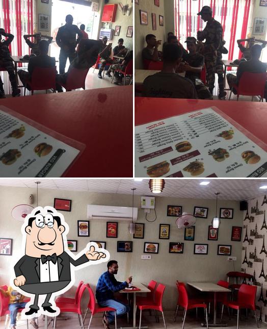 Take a seat at one of the tables at Mr.Burger Hut Ajnala