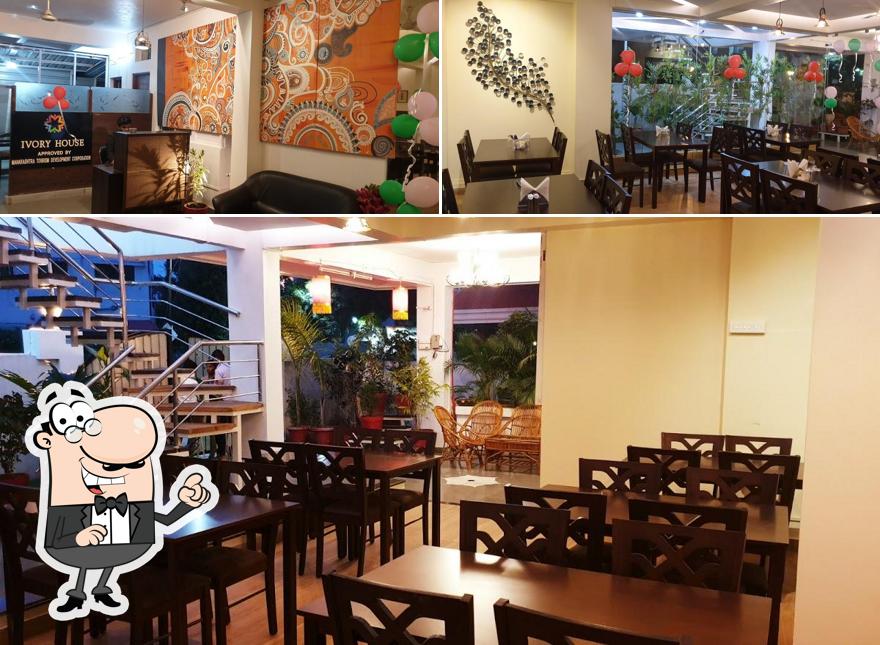 Take a seat at one of the tables at Ivory House Restaurant
