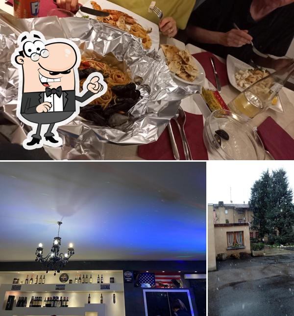 Tra le diverse cose da Ristorante Pizzeria Baciami Ancora si possono trovare la esterno e cibo