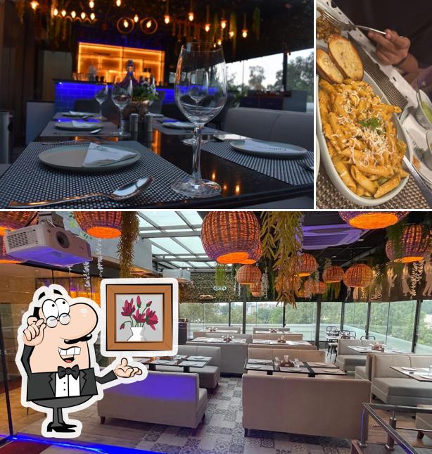 Take a look at the photo displaying interior and food at The Gala Restro Bar