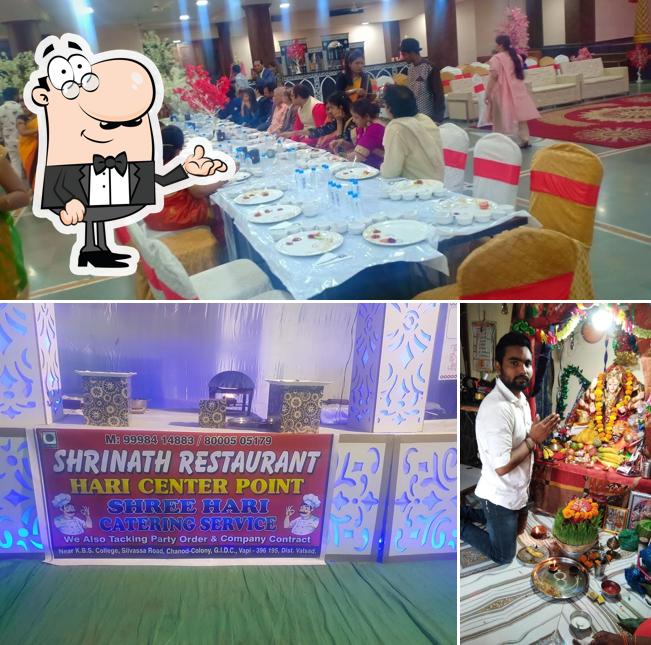 Take a seat at one of the tables at Shrinath Restaurant