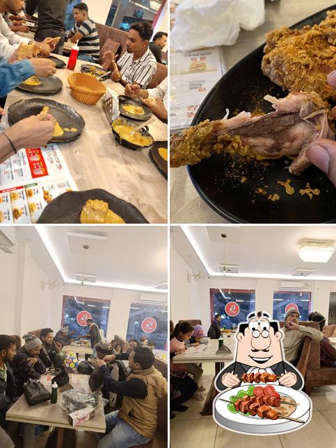 The photo of food and interior at Al baik Mubarakpar