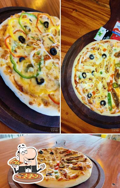 Get pizza at FROZEN TERRACE (pizzeria roof top) Thodupuzha