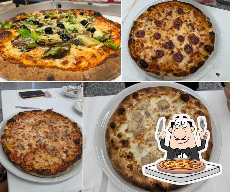 Prenditi una pizza a Ristorante Pizzeria Scacco Matto