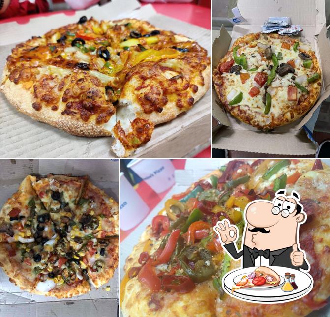 At Domino's Pizza Vega The Mall, Ajmer, you can taste pizza