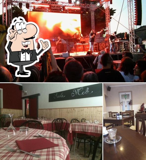 Siediti a un tavolo di Trattoria Siule Mole