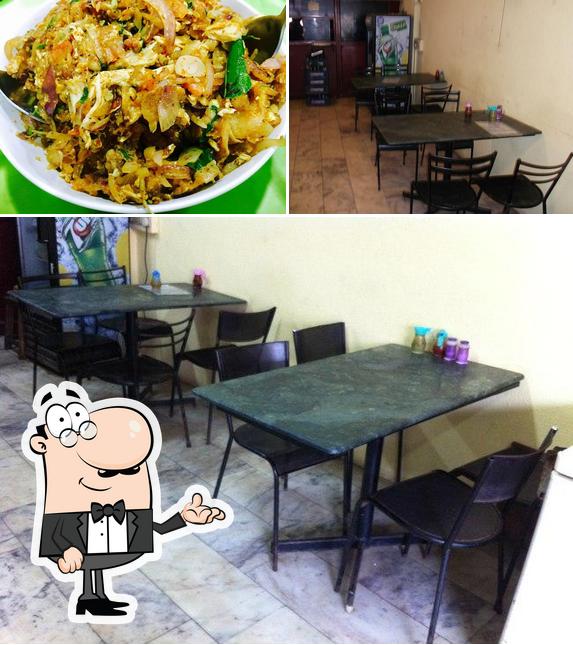 This is the photo showing interior and food at Food Park A/C Restaurant