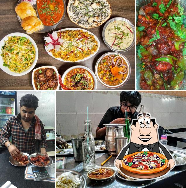 Try out pizza at Bharat Hindu Hotel