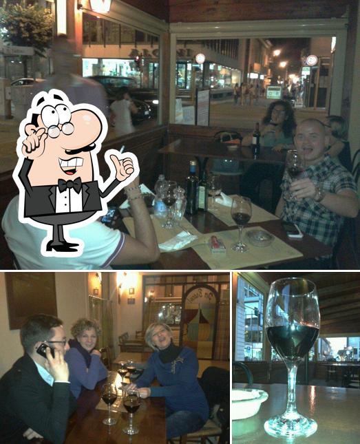 Siediti a un tavolo di Osteria Per Bacco