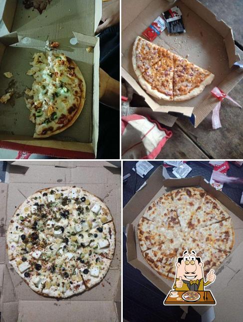 Get pizza at Blue Heaven pizza & fast food restaurant