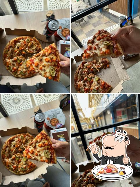 Order pizza at Happy Street ( Sweets & Restaurant)