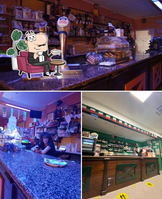 La interni e bancone da bar del ristorante
