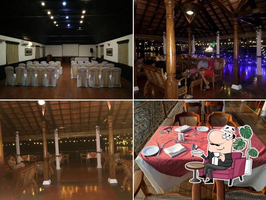 Take a seat at one of the tables at Vembanad, Kumarakom Lake Resort