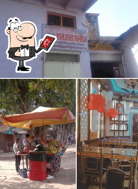 Check out the photo displaying exterior and dining table at Janta Restaurant