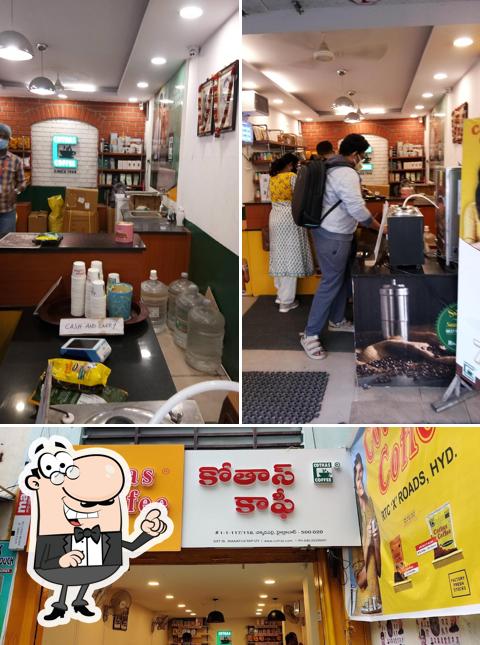 Take a seat at one of the tables at Cothas Coffee - RTC Cross - (Hyderabad)