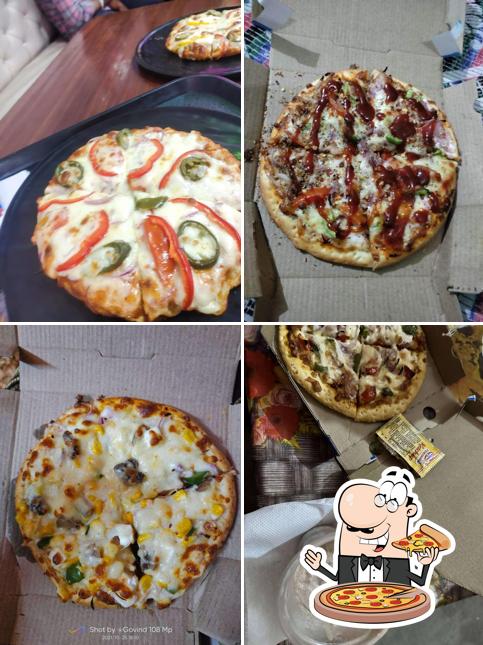 Try out pizza at Fresh Bite Pizza Zone Barrut