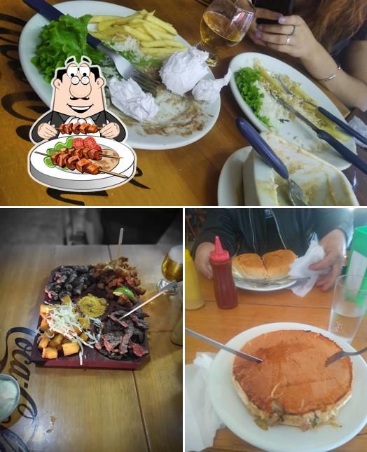 A ilustração do PALADAR LANCHES - RUA MUCK - CANOAS’s comida e mesa de jantar