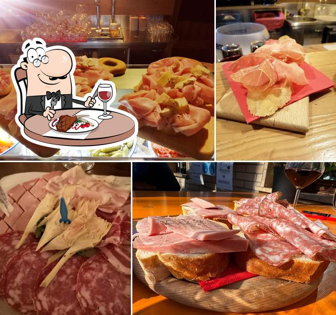 Prenditi i un pasto a base di carne a osteria al RIVUAT 1932