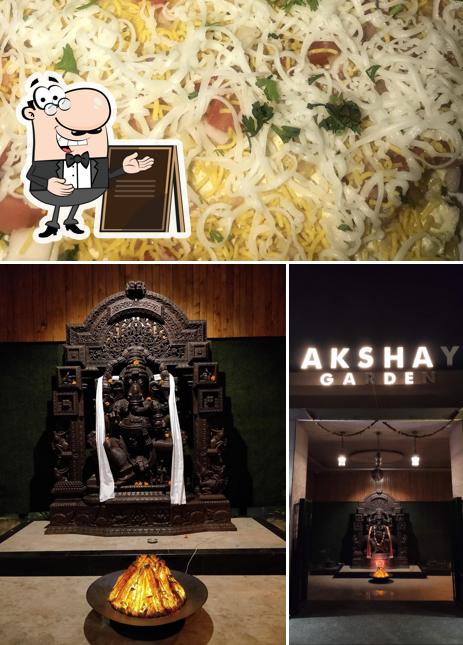 The picture of exterior and food at HOTEL AKSHAY GARDEN