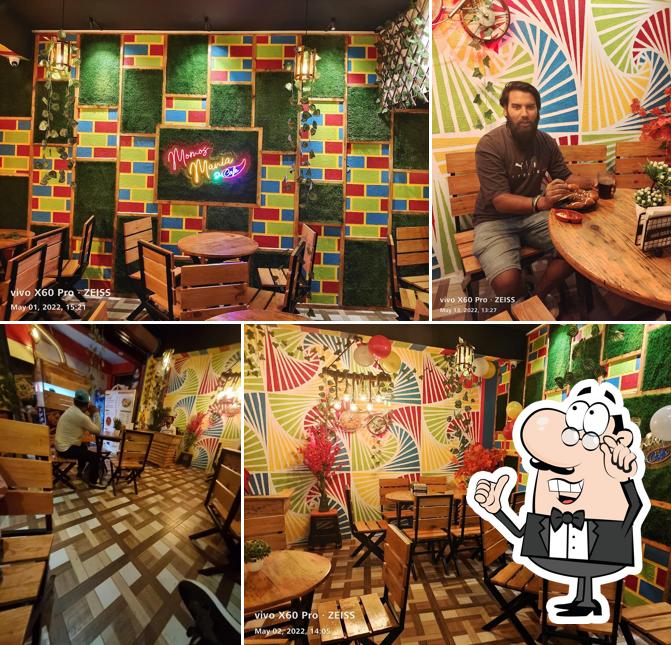 Take a seat at one of the tables at MOMOS MANIA