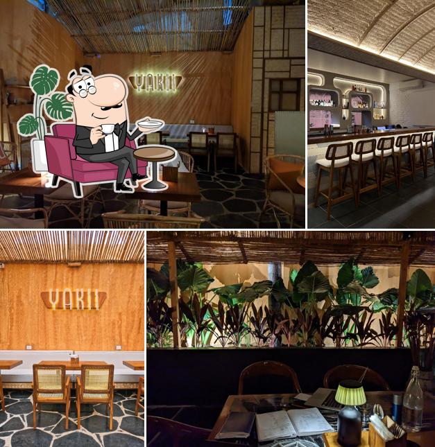 Take a seat at one of the tables at Yakii Asian Restaurant Sushi Dimsums Cocktails Brunch