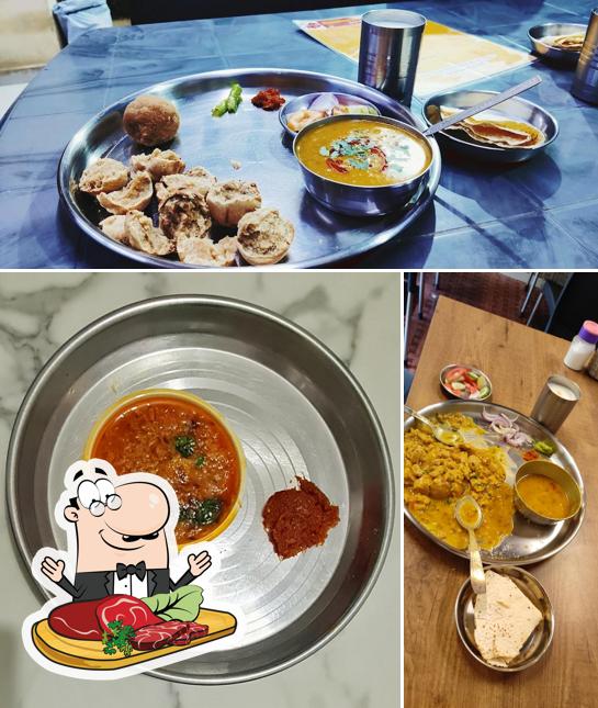 Mahakali Dal Bati surat offers meat dishes