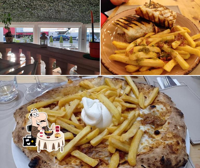 La immagine della cibo e esterno di Pizzalogy