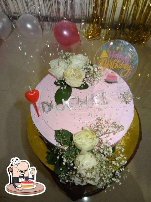 Look at this image of 7th Heaven Cake Shop