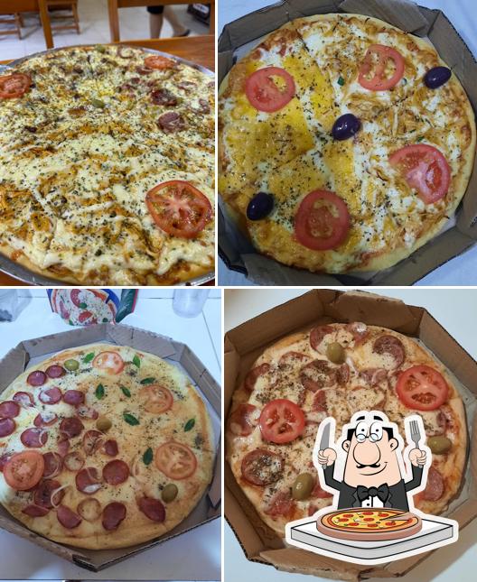 Escolha pizza no Gubi's Pizza