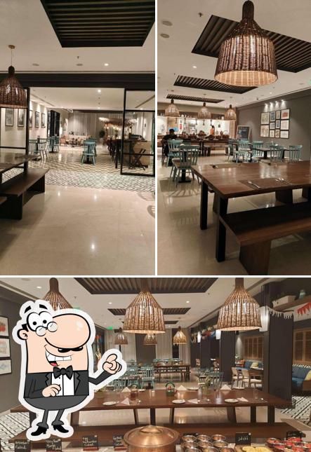 Check out how Lila's Kitchen - Port Muziris, A Tribute Portfolio Hotel by Marriott looks inside