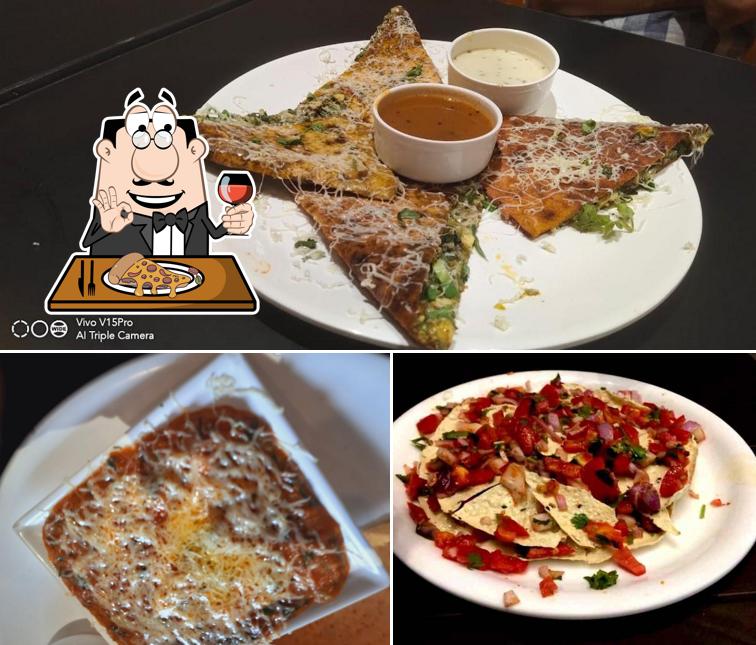 Get pizza at Mahesh Pav Bhaji