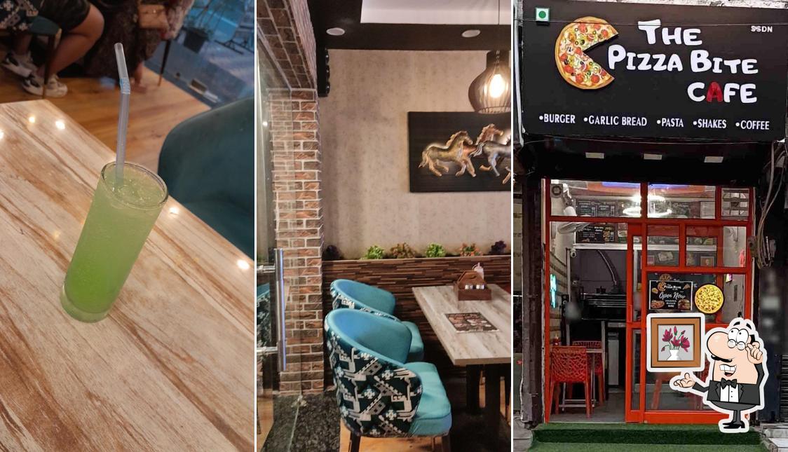 Take a seat at one of the tables at The Pizza Bite Cafe