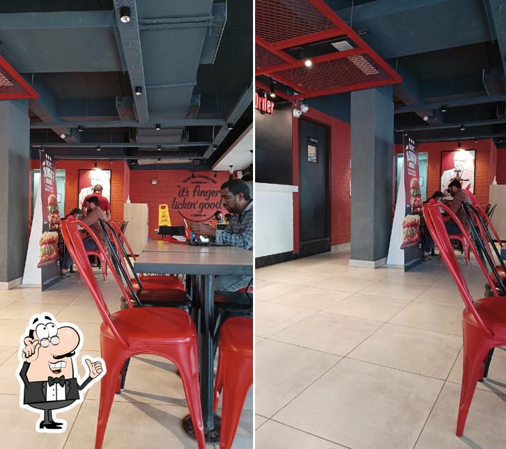 Take a seat at one of the tables at KFC