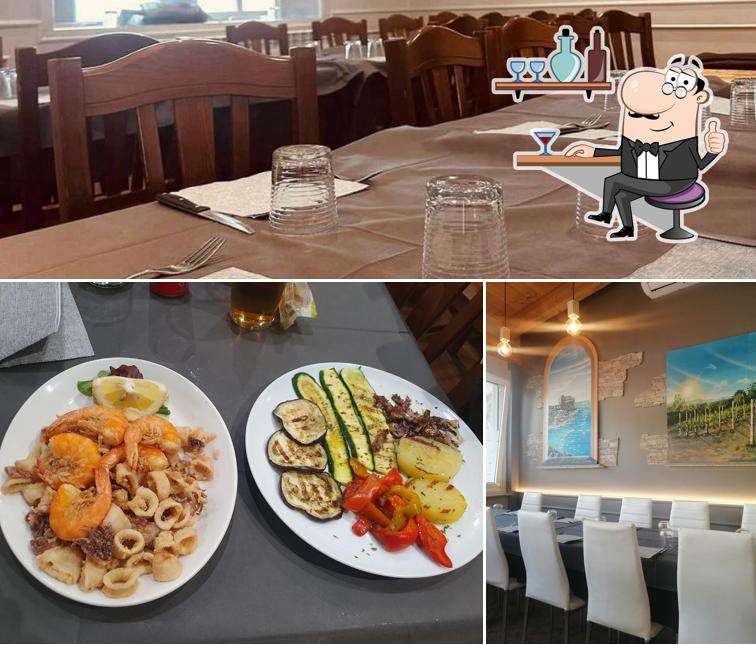 Questa è la foto che mostra la interni e cibo di Pizzeria Master Pizza - Ristorante Le Due Torri