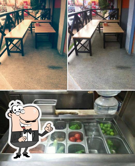 Take a seat at one of the tables at Mel B's