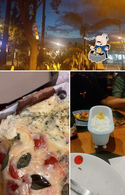 A foto da comida e exterior a Villa Soggiorno Pizzaria