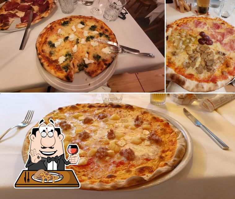 Prova una pizza a Locanda Ristorante Pizzeria I Riviù