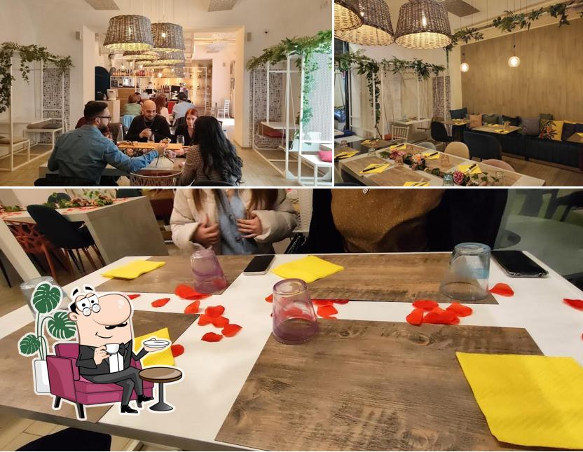 Siediti a un tavolo di LIVE pizza in pala bistrot