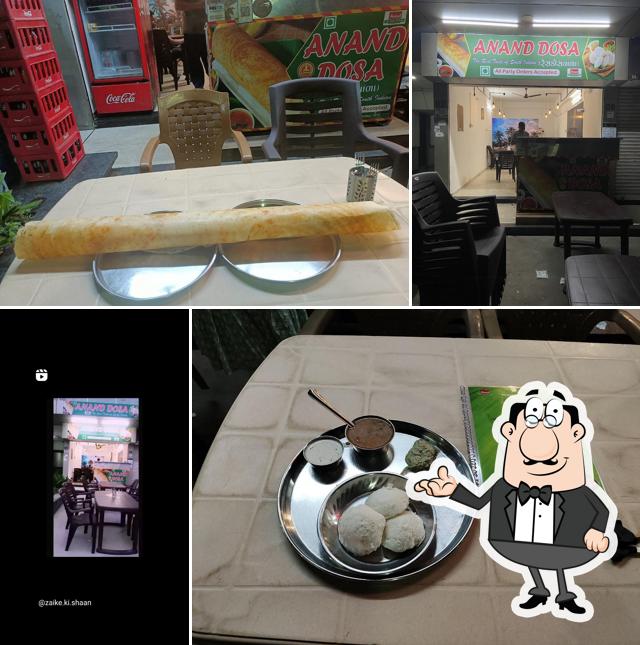 Take a seat at one of the tables at Anand Dosa - Best Restaurant in vadodara