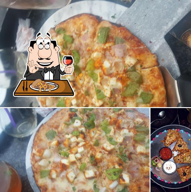 Get pizza at The Brew Estate