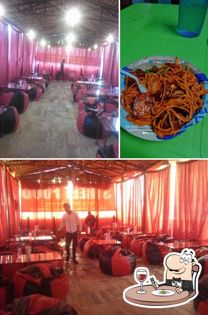 Take a look at the picture showing food and interior at STREET FOOD