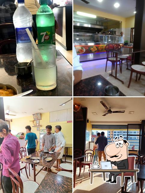 Take a seat at one of the tables at Hotel Khushi