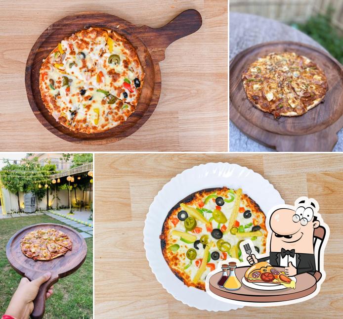 Pick pizza at God Father Kitchen