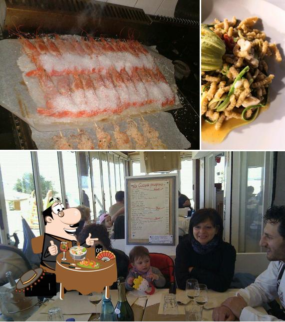 Questa è la foto che mostra la cibo e tavolo da pranzo di Habana Cafè Beach